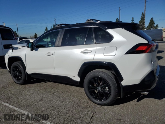 2024 Toyota RAV4 Hybrid XSE with VIN 2T3E6RFV4RW060903, listed as a Copart auction lot 49515785 with 8,637 mi miles and Salvage Title. Bid and sale history available at DreamBid. Image 2.