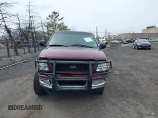1998 Ford F-150 XL with VIN 1FTDX18W9WKA01690, listed as a IAAI auction lot 41944734 with 176,359 mi miles. Bid and sale history available at carsss.com. Image 12.