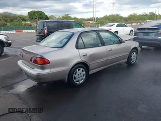 1999 Toyota Corolla VE with VIN 1NXBR12E4XZ182751, listed as a IAAI auction lot 41433066 with 56,904 mi miles and . Bid and sale history available at DreamBid. Image 4.