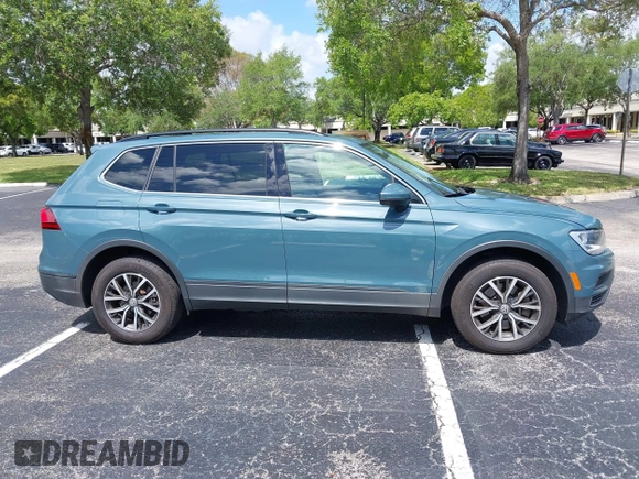 2019 Volkswagen Tiguan SE with VIN 3VV3B7AX8KM171057, listed as a IAAI auction lot 42209509 with 99,437 mi miles and . Bid and sale history available at DreamBid. Image 13.