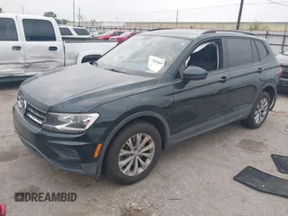 2019 Volkswagen Tiguan S with VIN 3VV1B7AXXKM002312, listed as a IAAI auction lot 42282809 with 80,781 mi miles and . Bid and sale history available at DreamBid. Image 17.