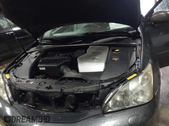 2007 Lexus RX 400h z VIN JTJGW31U172001122, wystawiony jako IAAI lot #42335831 z przebiegiem 232 699 mil mil oraz . Historia ofert i sprzedaży dostępna na DreamBid. Obrazek 10.