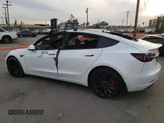 2022 Tesla Model 3 Performance with VIN 5YJ3E1EC3NF265334, listed as a Copart auction lot 84853734 with Not Provided miles and Salvage Title. Bid and sale history available at DreamBid. Image 2.