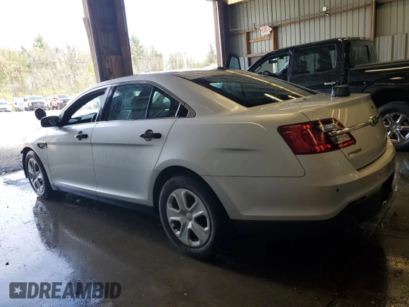 2013 Ford Police Interceptor with VIN 1FAHP2M8XDG127058, listed as a Copart auction lot 55180765 with 126,645 mi miles and Salvage title. Bid and sale history available at DreamBid. Image 2.