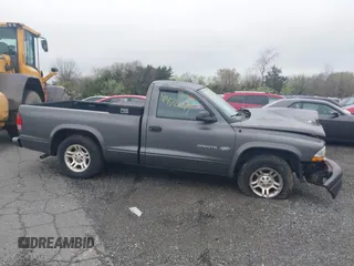 2002 Dodge Dakota with VIN 1B7FL16X62S683972, listed as a IAAI auction lot 41972271 with 158,436 mi miles and . Bid and sale history available at carsss.com. Image 13.