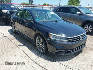 2019 Volkswagen Passat SE R-Line z VIN 1VWMA7A33KC009628, wystawiony jako IAAI lot #42180871 z przebiegiem 72 672 mil mil oraz . Historia ofert i sprzedaży dostępna na DreamBid. Obrazek 1.