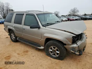 2000 Cadillac Escalade z VIN 1GYEK63R9YR218680, wystawiony jako Copart lot #87393204 z przebiegiem 295 494 mil mil oraz Szkoda całkowita • Salvage title. Historia ofert i sprzedaży dostępna na DreamBid. Obrazek 4.
