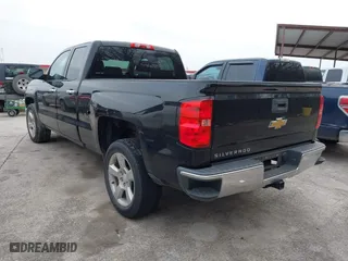 2015 Chevrolet Silverado 1500 LS with VIN 1GCRCPEH4FZ328290, listed as a IAAI auction lot 41584552 with 228,549 mi miles. Bid and sale history available at carsss.com. Image 3.