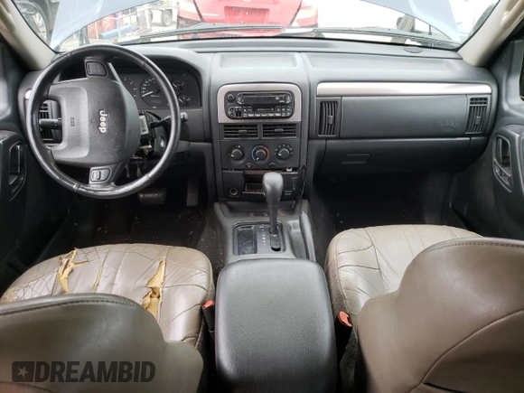 2002 Jeep Grand Cherokee z VIN 1J4GX38S42C229150, wystawiony jako Copart lot #72586834 z przebiegiem 201 103 mil mil oraz Szkoda całkowita • Salvage title. Historia ofert i sprzedaży dostępna na DreamBid. Obrazek 8.