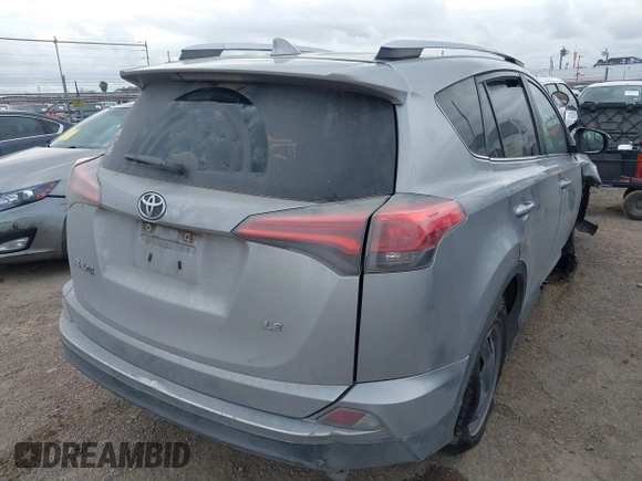 2016 Toyota RAV4 LE with VIN 2T3ZFREV4GW306588, listed as a IAAI auction lot 41686915 with 188,615 mi miles and . Bid and sale history available at DreamBid. Image 4.