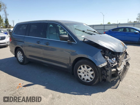2010 Honda Odyssey LX with VIN 5FNRL3H29AB065521, listed as a Copart auction lot 45743455 with 128,389 mi miles and Salvage Title. Bid and sale history available at carsss.com. Image 4.