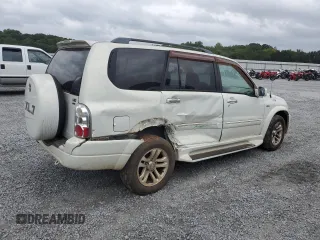 2005 Suzuki XL7 LX z VIN JS3TX92V254105078, wystawiony jako Copart lot #69820194 z przebiegiem 224 805 mil mil oraz Szkoda całkowita • Salvage title. Historia ofert i sprzedaży dostępna na DreamBid. Obrazek 3.