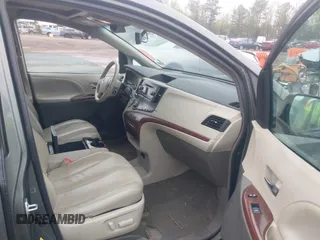 2013 Toyota Sienna XLE AAS with VIN 5TDYK3DC8DS401561, listed as a IAAI auction lot 41990044 with 214,111 mi miles and . Bid and sale history available at DreamBid. Image 5.