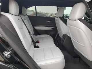 2024 Cadillac XT4 FWD Sport with VIN 1GYFZER46RF213543, listed as a Copart auction lot 83609754 with 3,878 mi miles and Salvage title. Bid and sale history available at DreamBid. Image 11.