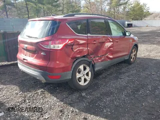 2016 Ford Escape SE with VIN 1FMCU9GX7GUC85187, listed as a IAAI auction lot 41678991 with 123,812 mi miles and . Bid and sale history available at DreamBid. Image 4.