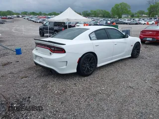 2019 Dodge Charger Scat Pack with VIN 2C3CDXGJ9KH691136, listed as a IAAI auction lot 42056137 with 78,814 mi miles and . Bid and sale history available at DreamBid. Image 4.