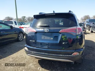 2018 Toyota RAV4 XLE with VIN JTMWFREV7JJ186925, listed as a IAAI auction lot 41717611 with 79,580 mi miles. Bid and sale history available at carsss.com. Image 16.
