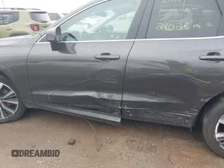 2022 Volvo XC60 Momentum с VIN YV4L12RK5N1051289, выставлен на аукционе IAAI как лот 41139997 с пробегом 28 028 миль миль и . История ставок и продаж доступна на DreamBid. Изображение 14.