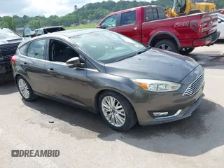 2018 Ford Focus Titanium with VIN 1FADP3N28JL323825, listed as a IAAI auction lot 42341286 with 46,565 mi miles and . Bid and sale history available at DreamBid. Image 1.