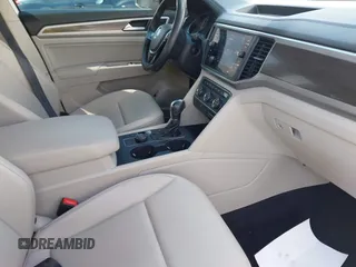 2019 Volkswagen Atlas SE z VIN 1V2UR2CAXKC539779, wystawiony jako IAAI lot #42188614 z przebiegiem 49 994 mil mil oraz . Historia ofert i sprzedaży dostępna na DreamBid. Obrazek 5.
