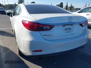 2015 Mazda 6 i Sport with VIN JM1GJ1U59F1211787, listed as a IAAI auction lot 41645517 with 83,537 mi miles. Bid and sale history available at carsss.com. Image 3.