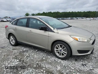 2016 Ford Focus SE z VIN 1FADP3F2XGL341167, wystawiony jako Copart lot #59042435 z przebiegiem 71 345 mil mil oraz Szkoda całkowita • Salvage title. Historia ofert i sprzedaży dostępna na DreamBid. Obrazek 4.