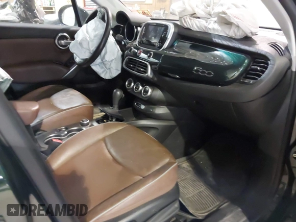 2016 FIAT 500X Lounge with VIN ZFBCFYDT1GP470721, listed as a IAAI auction lot 41293223 with 104,478 mi miles and . Bid and sale history available at DreamBid. Image 5.