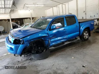 2010 Toyota Tacoma with VIN 5TELU4ENXAZ693805, listed as a Copart auction lot 63012925 with 184,619 mi miles and Salvage title. Bid and sale history available at DreamBid. Image 1.