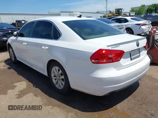 2013 Volkswagen Passat SE with VIN 1VWBP7A32DC007863, listed as a IAAI auction lot 42452096 with 207,083 mi miles and . Bid and sale history available at DreamBid. Image 3.