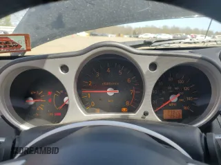 2004 Nissan 350Z Touring z VIN JN1AZ36A74M252230, wystawiony jako Copart lot #53355875 z przebiegiem 77 820 mil mil oraz Szkoda całkowita • Salvage title. Historia ofert i sprzedaży dostępna na DreamBid. Obrazek 9.