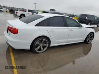 2014 Audi A6 3.0T Prestige with VIN WAUHGAFC9EN113121, listed as a Copart auction lot 80031824 with 106,026 mi miles and Salvage Title. Bid and sale history available at carsss.com. Image 3.