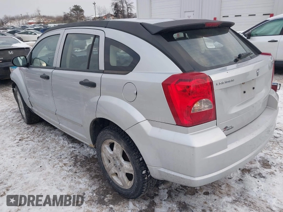 2007 Dodge Caliber SXT with VIN 1B3HB48B07D159549, listed as a IAAI auction lot 41330969 with 124,911 mi miles and . Bid and sale history available at DreamBid. Image 3.