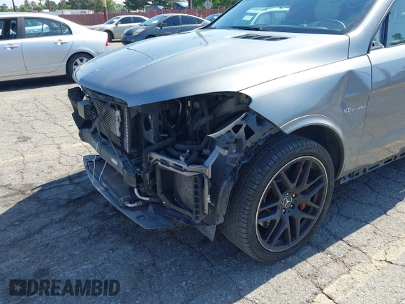 2016 Mercedes-Benz GLE 63 S AMG with VIN 4JGDA7FB6GA631271, listed as a IAAI auction lot 42470832 with 120,972 mi miles and . Bid and sale history available at DreamBid. Image 6.