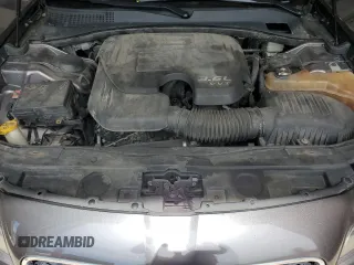 2015 Chrysler 300 Limited z VIN 2C3CCAAGXFH853441, wystawiony jako Copart lot #57104005 z przebiegiem 209 980 mil mil oraz Szkoda całkowita • Salvage title. Historia ofert i sprzedaży dostępna na DreamBid. Obrazek 11.
