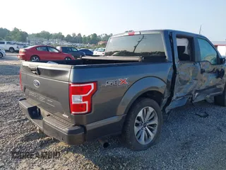 2018 Ford F-150 XL with VIN 1FTEW1EP9JFB24945, listed as a IAAI auction lot 42380592 with 132,895 mi miles and . Bid and sale history available at DreamBid. Image 4.
