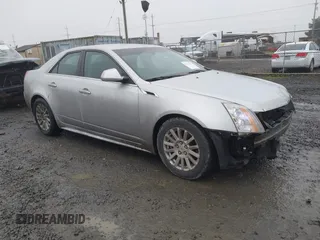 2012 Cadillac CTS Luxury with VIN 1G6DE5E54C0101490, listed as a IAAI auction lot 41331012 with 169,289 mi miles and . Bid and sale history available at DreamBid. Image 1.