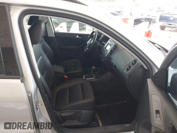 2016 Volkswagen Tiguan S with VIN WVGBV7AX2GW535784, listed as a IAAI auction lot 42130041 with 35,718 mi miles and . Bid and sale history available at DreamBid. Image 5.