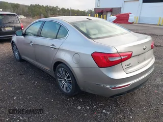 2014 Kia Cadenza Premium with VIN KNALN4D72E5143262, listed as a IAAI auction lot 41663400 with 176,471 mi miles. Bid and sale history available at carsss.com. Image 3.