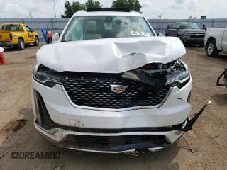 2021 Cadillac XT6 Premium Luxury with VIN 1GYKPCRS5MZ167010, listed as a Copart auction lot 63780174 with 0 mi miles and Salvage Title. Bid and sale history available at carsss.com. Image 5.