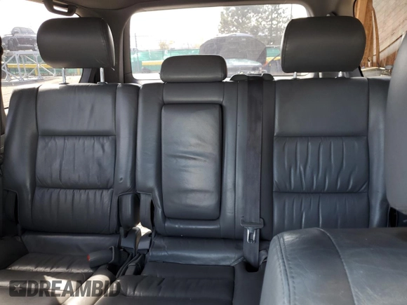2002 Toyota Land Cruiser z VIN JTEHT05J522027452, wystawiony jako Copart lot #51141595 z przebiegiem 278 465 mil mil oraz Szkoda całkowita • Salvage title. Historia ofert i sprzedaży dostępna na DreamBid. Obrazek 10.