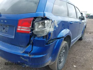 2015 Dodge Journey SE z VIN 3C4PDCAB8FT552555, wystawiony jako IAAI lot #42195398 z przebiegiem 149 503 mil mil oraz . Historia ofert i sprzedaży dostępna na DreamBid. Obrazek 12.