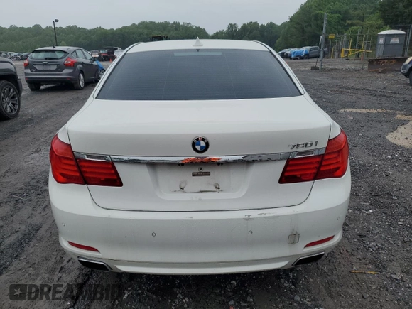 2012 BMW 7 Series 750i z VIN WBAKA8C51CCY37495, wystawiony jako Copart lot #56914295 z przebiegiem 126 697 mil mil oraz Czysty tytuł • Clean title. Historia ofert i sprzedaży dostępna na DreamBid. Obrazek 6.