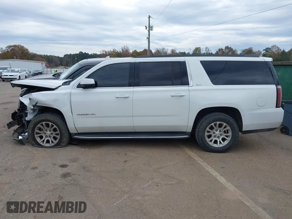 2019 GMC Yukon XL SLT with VIN 1GKS2GKC7KR165419, listed as a IAAI auction lot 40977930 with 167,195 mi miles and . Bid and sale history available at carsss.com. Image 14.