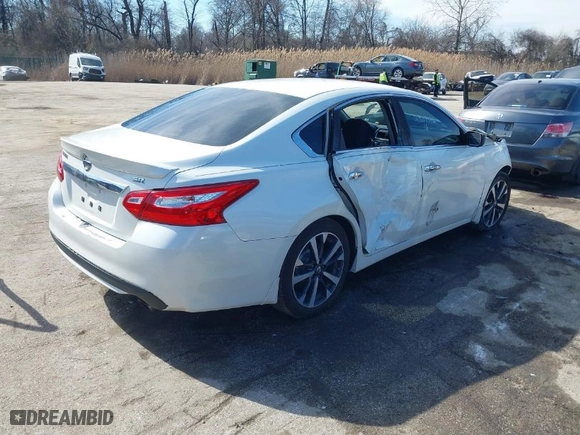 2016 Nissan Altima 2.5 SR with VIN 1N4AL3AP0GN374846, listed as a IAAI auction lot 41659546 with 126,496 mi miles. Bid and sale history available at carsss.com. Image 4.