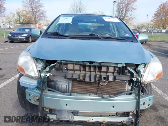 2009 Toyota Yaris with VIN JTDBT903794060474, listed as a IAAI auction lot 42005903 with 104,607 mi miles. Bid and sale history available at carsss.com. Image 6.