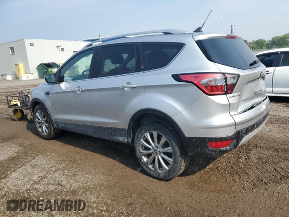 2018 Ford Escape Titanium с VIN 1FMCU9J9XJUD44928, выставлен на аукционе Copart как лот 59675445 с пробегом 37 485 миль миль и Чистый • Clean title. История ставок и продаж доступна на DreamBid. Изображение 2.