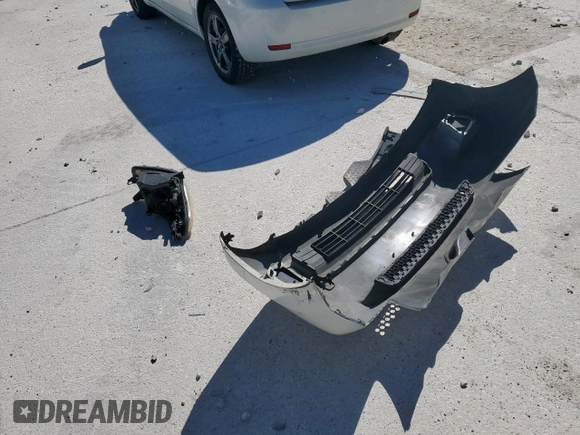 2012 Scion xD with VIN JTKKU4B46C1017963, listed as a Copart auction lot 49777595 with 118,606 mi miles and Salvage Title. Bid and sale history available at DreamBid. Image 12.