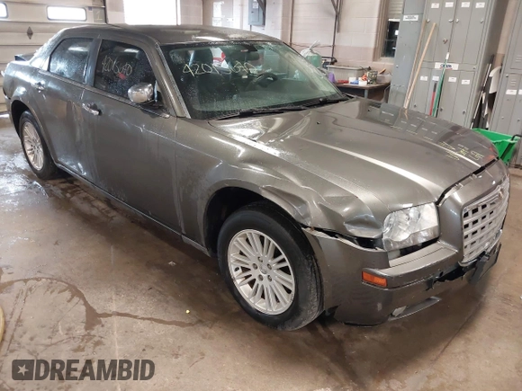2010 Chrysler 300 Touring with VIN 2C3CA5CV9AH101800, listed as a IAAI auction lot 42015640 with 128,457 mi miles and . Bid and sale history available at DreamBid. Image 1.