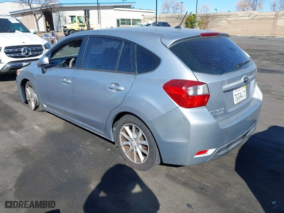 2014 Subaru Impreza Wagon 2.0i Premium with VIN JF1GPAC64E8257757, listed as a IAAI auction lot 41698899 with 173,373 mi miles. Bid and sale history available at carsss.com. Image 3.