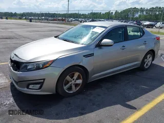 2015 Kia Optima LX with VIN 5XXGM4A79FG477619, listed as a IAAI auction lot 42561432 with 125,274 mi miles and . Bid and sale history available at DreamBid. Image 2.
